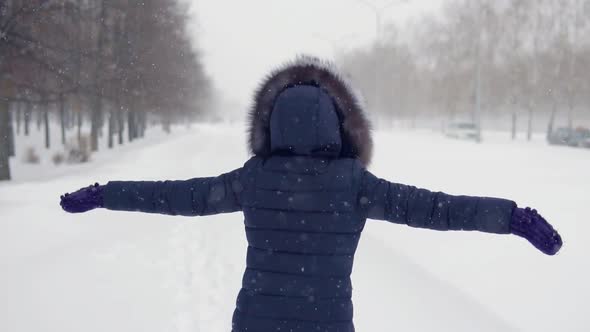 Beautiful Woman in Winter Park. Walks in the Open Air