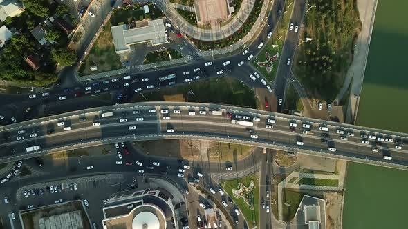 Aerial Top Down View From Drone of Traffic Bridge City with Driving Car