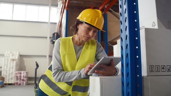 Caucasian elegance woman working in warehouse. Shot with RED helium camera in 8K.