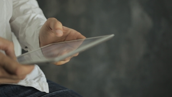 Close-up Of Young Male Professional White Using