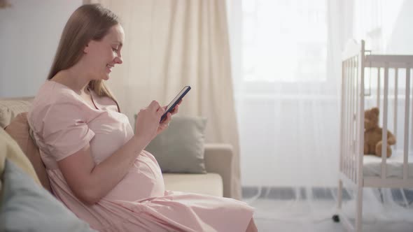 Pregnant Woman With Smartphone