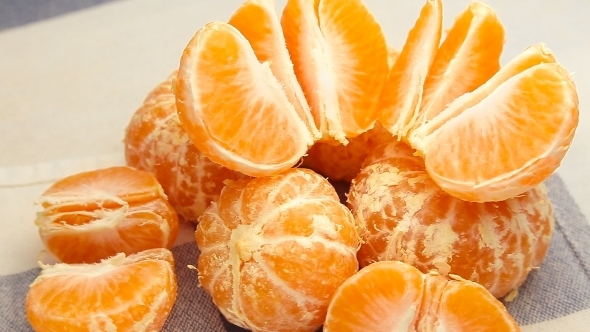 Peeled Tangerines Rotate