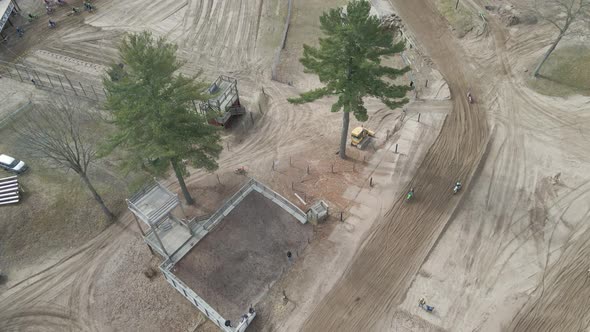 Aerial Drone shot of dirt bike track, during motos.Shot on a DJI drone 4k 60p