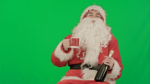 Santa Claus Celebrating Champagne On a Green