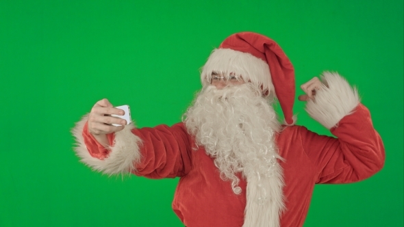 Santa Claus Doing a Selfie On a Green Screen alt