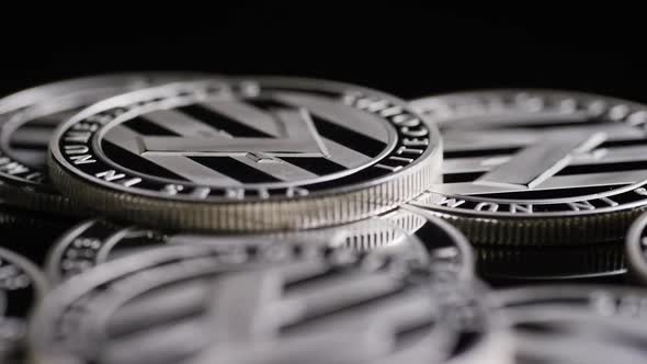 Rotating shot of Bitcoins (digital cryptocurrency) - BITCOIN LITECOIN 438