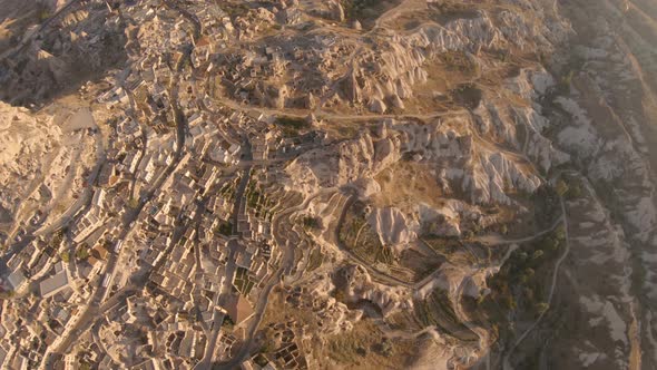 Cappadocia Aerial Shot of Rock Chimneys and Uchisar Castle in Goreme Turkey