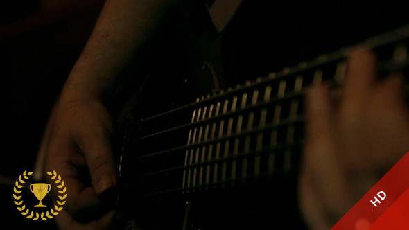 Bass Guitar Being Played