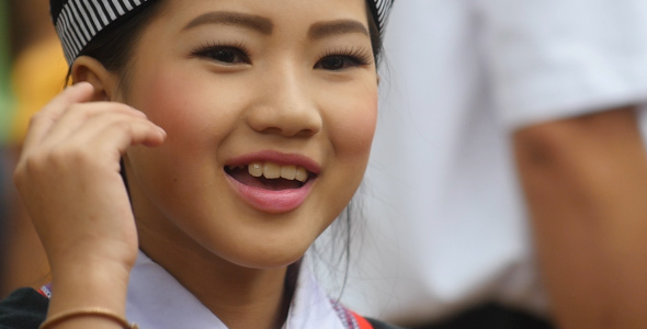 Young Hmong Girl Happy Playing A Ball