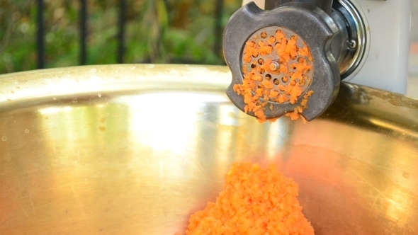 Carrot Being Chopped Into Tiny Pieces 