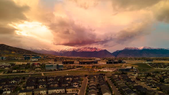 Lehi, Utah or Silicon Slopes aerial hyper lapse during an epic sunset and colorful cloudscape