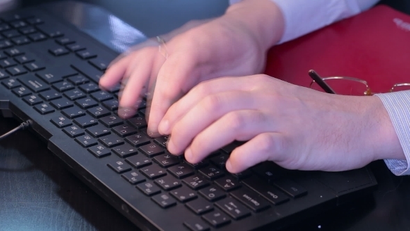 Businesman Typing On Keyboard
