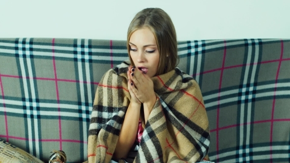 Attractive Woman Are Wrapped In a Blanket