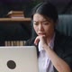 Shocked Asian Businesswoman Upset with Bad Deal Looking at Laptop Screen Reaction on Crisis - VideoHive Item for Sale