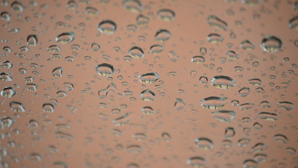 Raindrops Sliding Down in a Glass