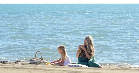 Mother And Daughter At a Picnic