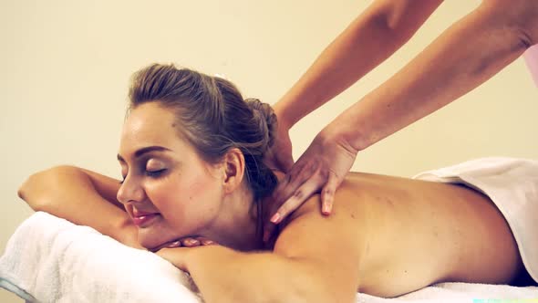 Woman Gets Back Massage Spa By Massage Therapist