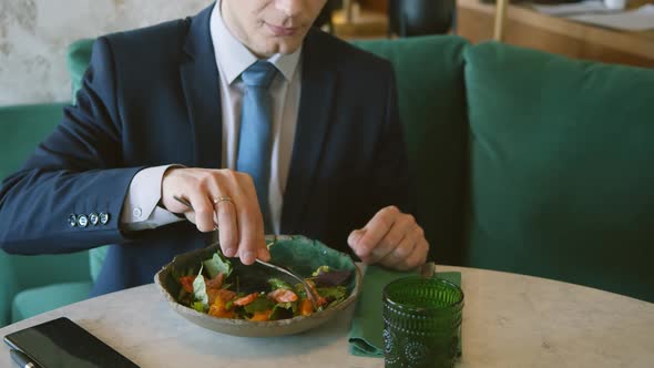 Business Man Getting Meal on Plate at Restaurant