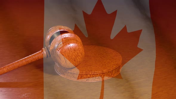 Canadian judiciary. Flag of Canada and Judge's gavel.