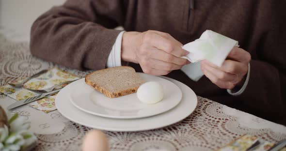 Man Wiping Hand Before Breakfast At Home