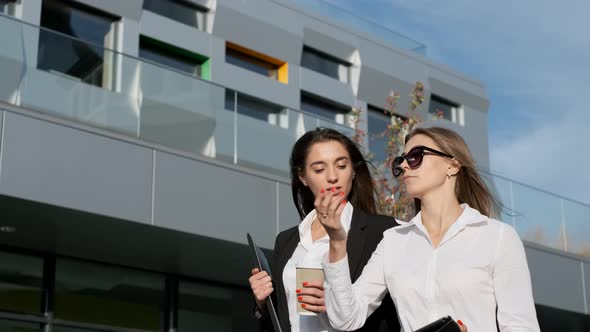 Meeting Of Two Young Businesswomen