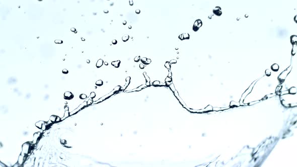Super Slow Motion Shot of Water Splash at 1000Fps on White Background alt