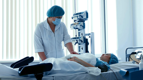 Doctor Preparing Pregnant Woman