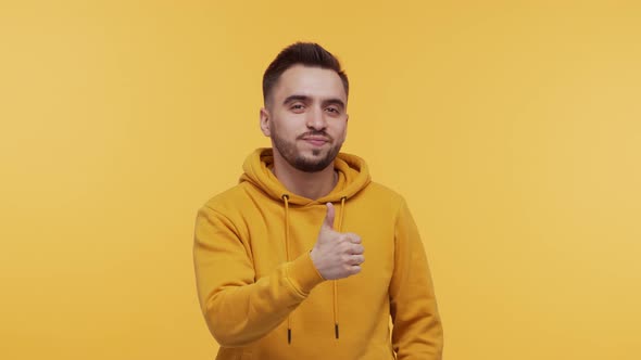 Expressive young man screaming and shouting over vibrant background.