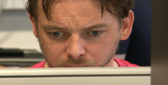 Office Worker Looking at Computer Screen