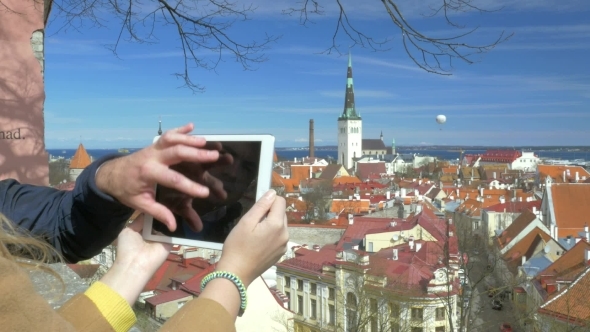 People Taking Top View Photos Of Historic City Of