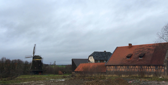 Mill and Old German Houses in Field