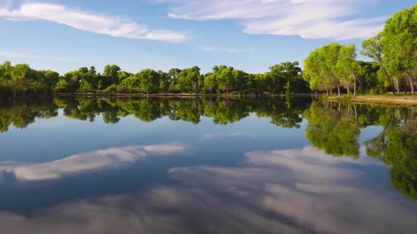 Scenic Lake with Cloud Reflections Timelapse