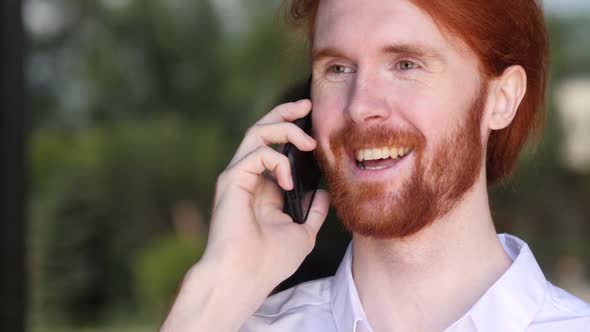 Portrait of Designer Talking on Phone