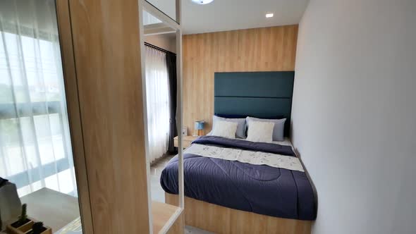 Stylish Compact Bedroom With Built-In Walk-in Closet