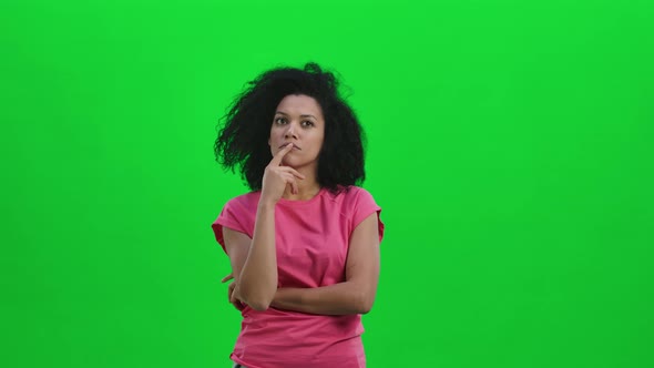 Portrait of Young Female African American Focused Thinking About Something No Idea