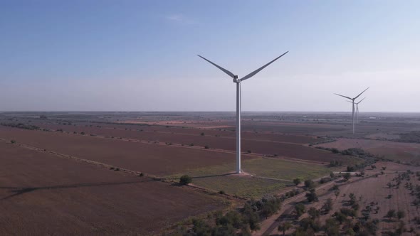 Wind Turbines on Morning Sky Background