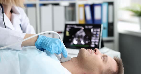 Thyroid Scan on Ultrasound Scanner Machine in Hospital for Patient