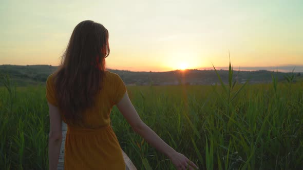 Woman walking in the evening