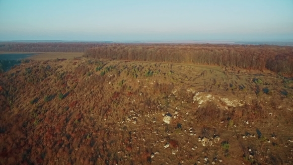 Aerial View Of Autumn Forest At Sunset