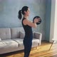 Young Woman Does Sports Exercises with Weight Plate at Home - VideoHive Item for Sale