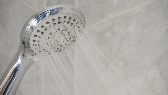 Shower Faucet Open Expelling Water in Bath