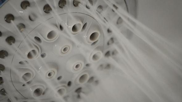 Shower Faucet Expelling Water in Bath alt