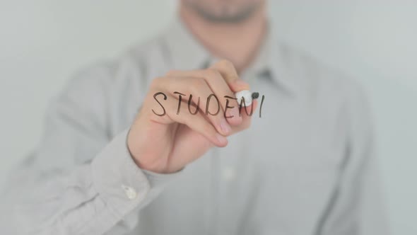 Student Writing on Screen with Hand