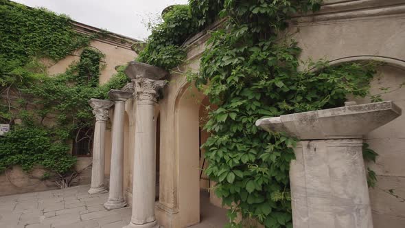 Beautiful View of Old Stone Building in Historic City on Summer Day.