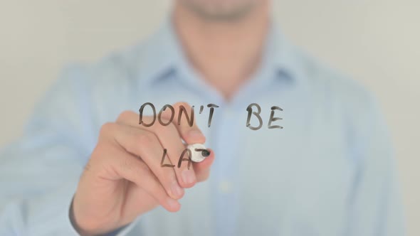 Do not Be Lazy, Man Writing on Transparent Screen