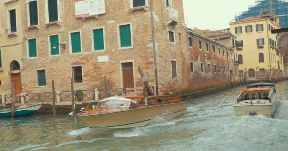 Touristic Boats Sailing On Canal Of Venice