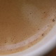 Stirring Fresh Coffee in a Cup with Foam - VideoHive Item for Sale