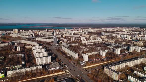 Apartment Buildings and Wide Roads in City Against River