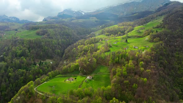 Aerial Video of the Small Town of Pasturo in Lombardy North Italy Showing Mountain Panorama Forest