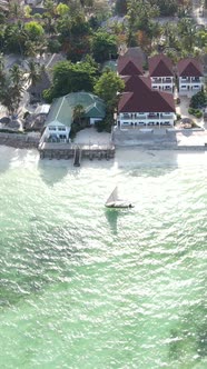 Vertical Video Boats in the Ocean Near the Coast of Zanzibar Tanzania